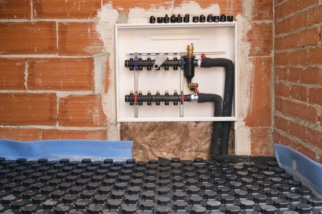 Radiant underfloor heating hydronic manifold.